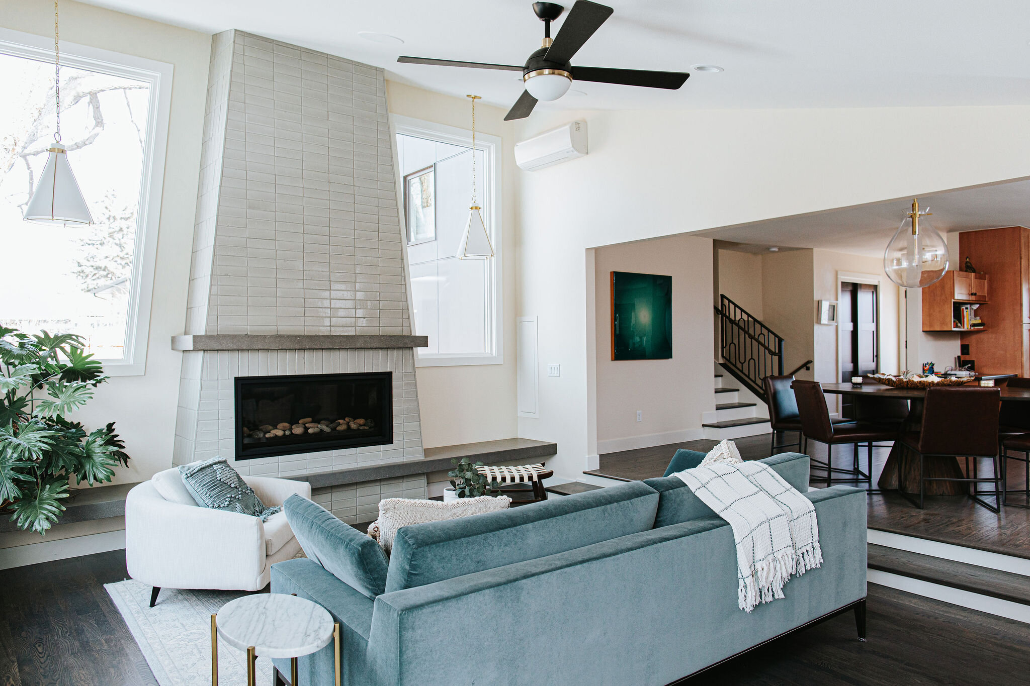 Remodeled living room with custom tiled fireplace, Fort Collins